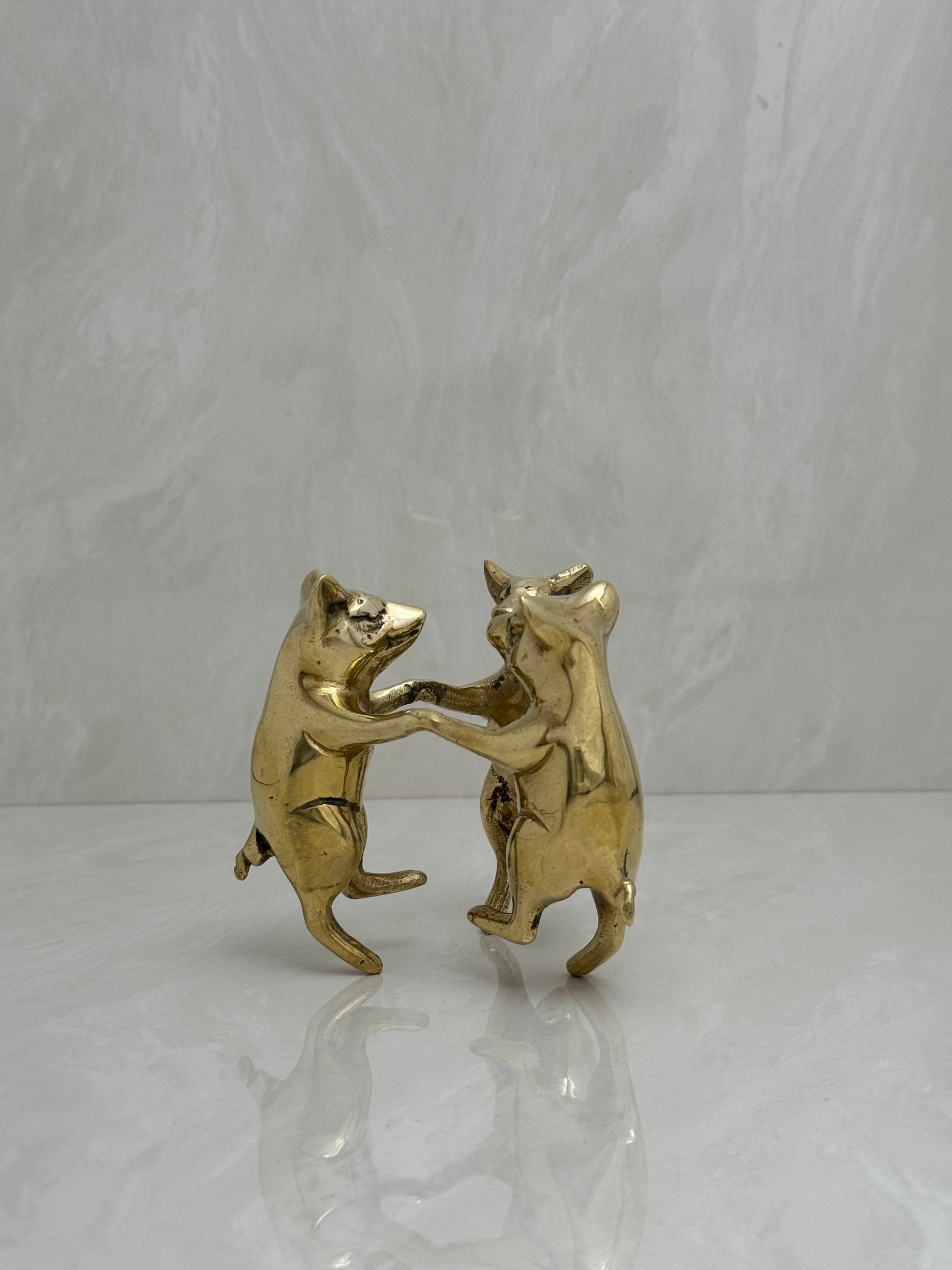Vintage Brass Frolicking Pigs Holding Hands