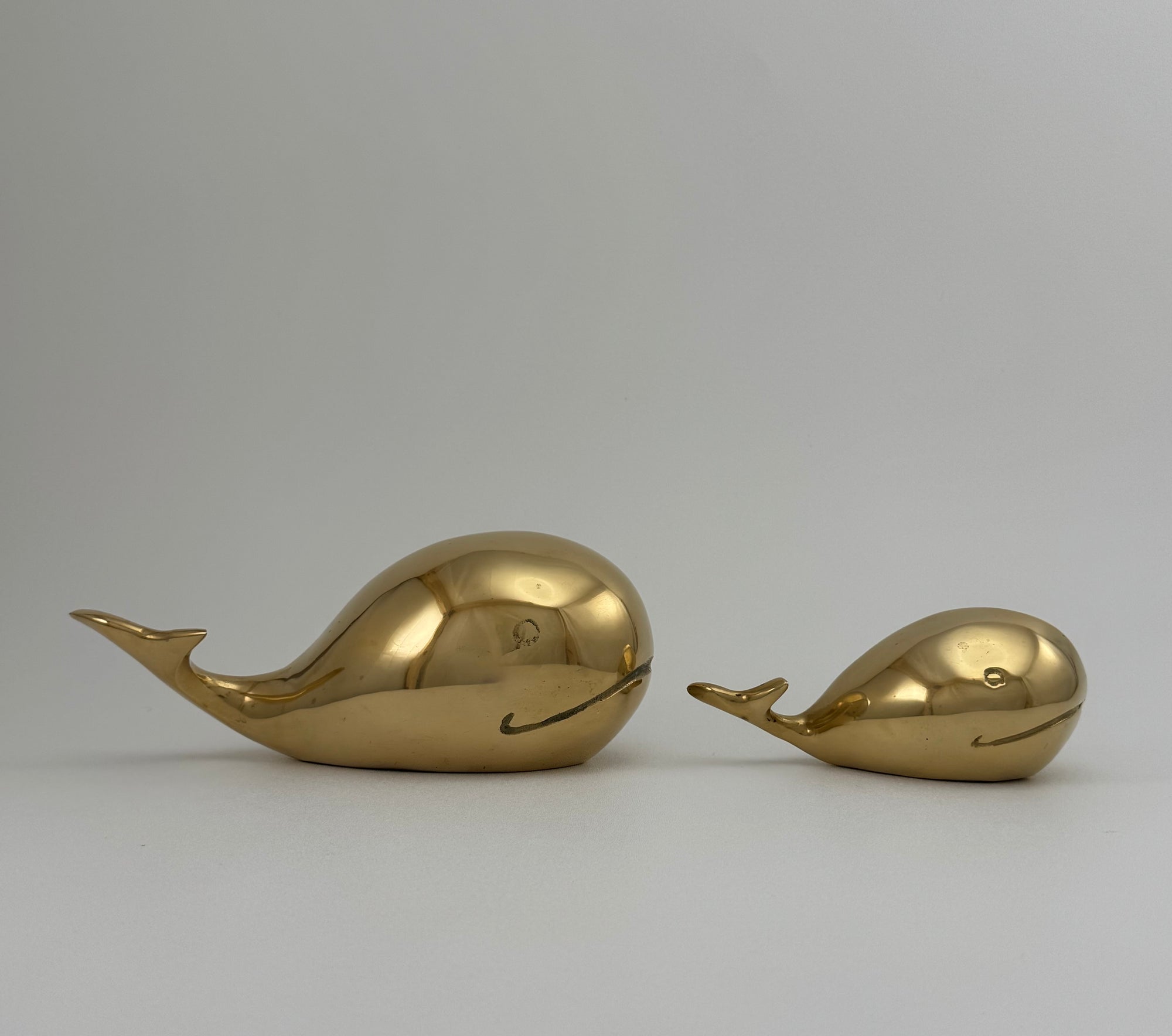 Vintage Brass Whale Pair – Large &amp; Small Coastal Nautical Sculptures