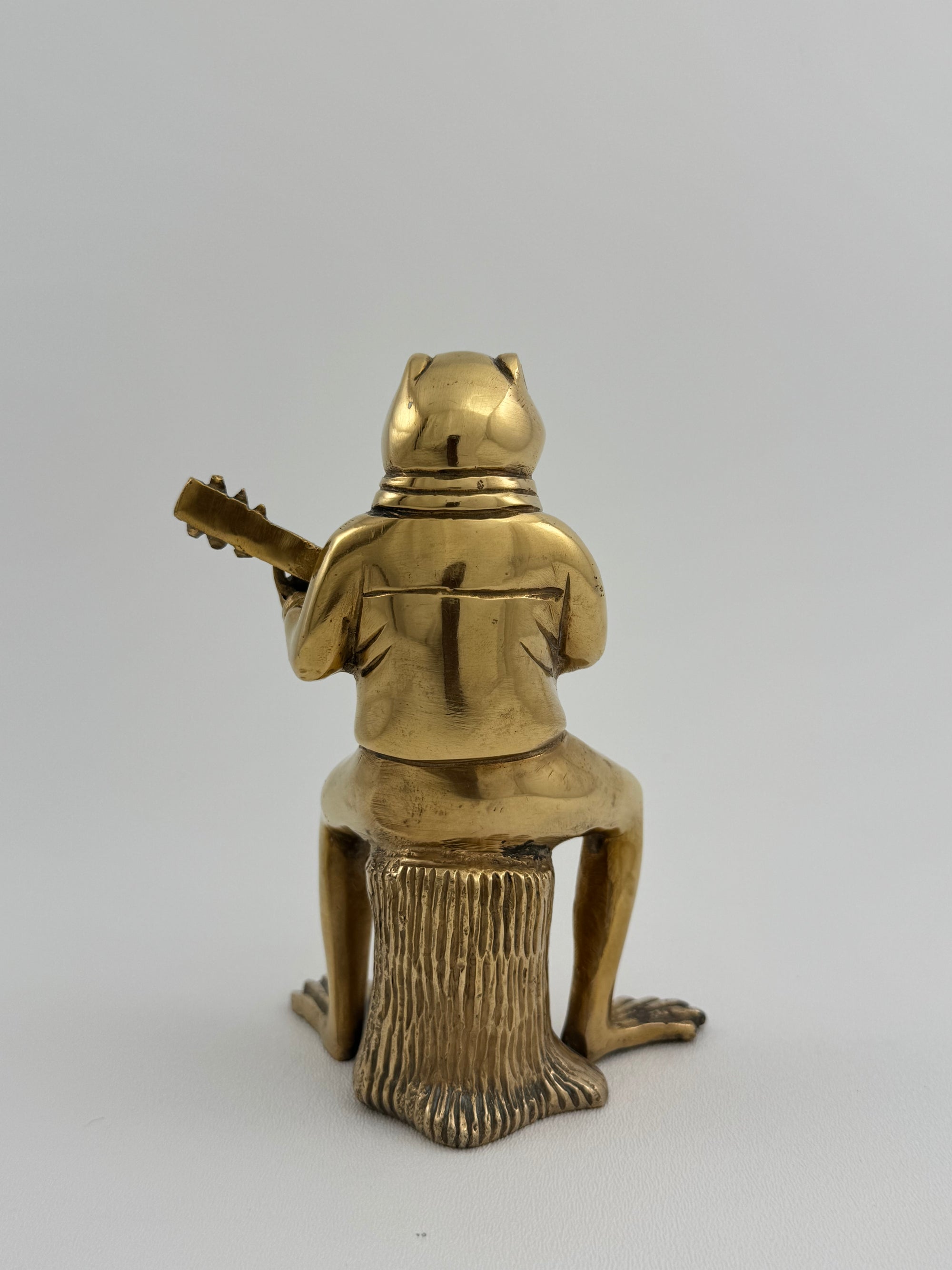 Melodic Croak: Vintage Brass Frog Guitarist on Stump Playing Guitar-Figurine