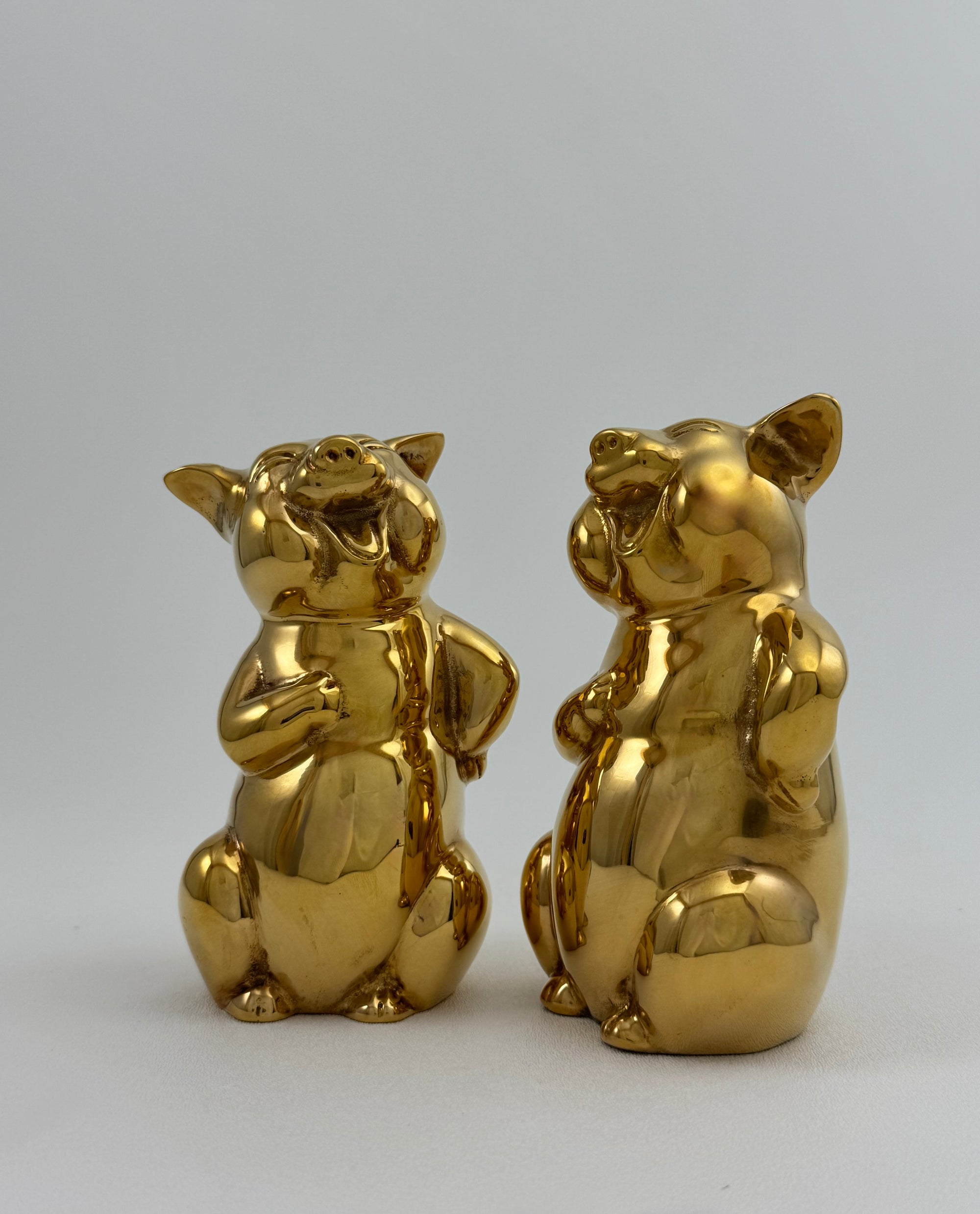 Pair of Vintage Brass Laughing Pig Figurines