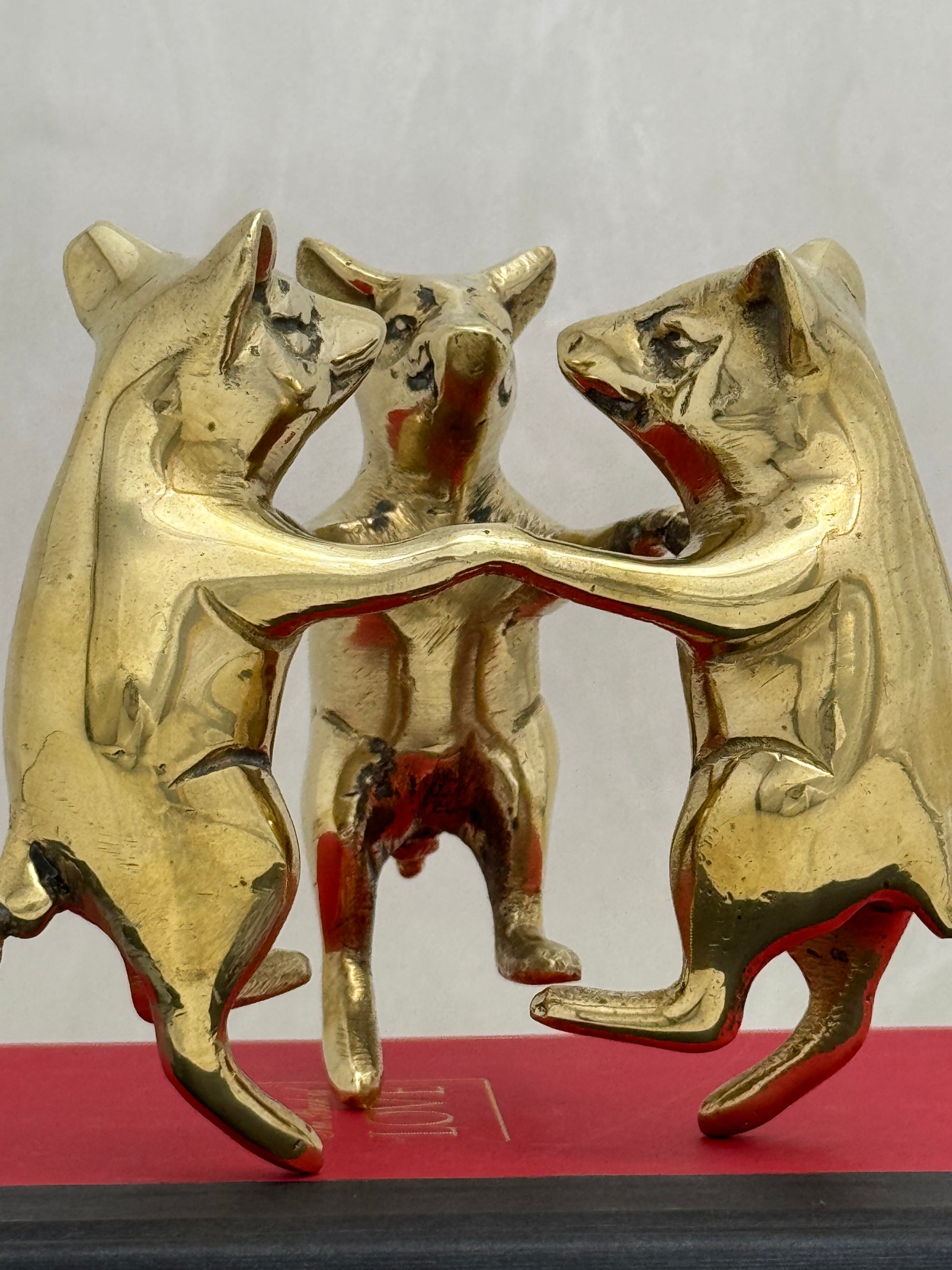 Vintage Brass Frolicking Pigs Holding Hands