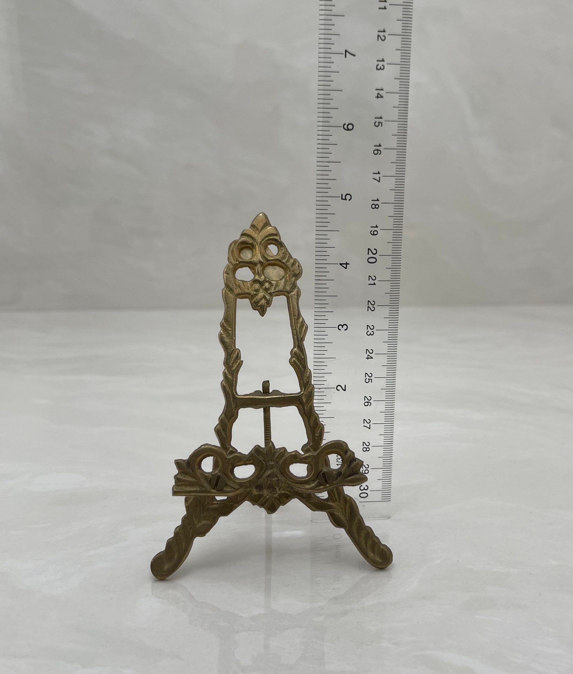 What is a Little Boy Decorative Plate on Brass Easel