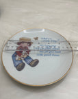 What is a Little Boy Decorative Plate on Brass Easel