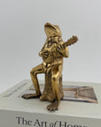 Melodic Croak: Brass Frog Guitarist Figurine Vintage Brass Frog on Stump Playing Guitar