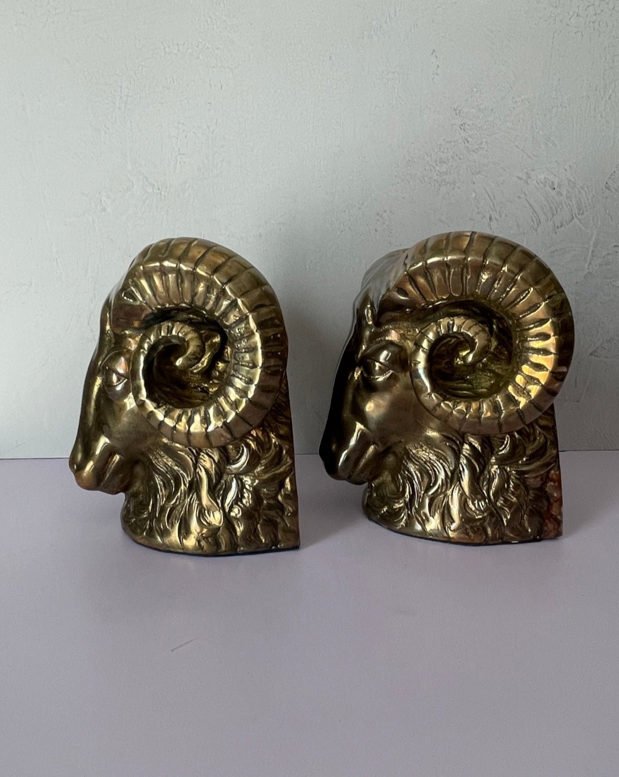 Vintage Mid-Century Brass Ram Bookends
- A Pair