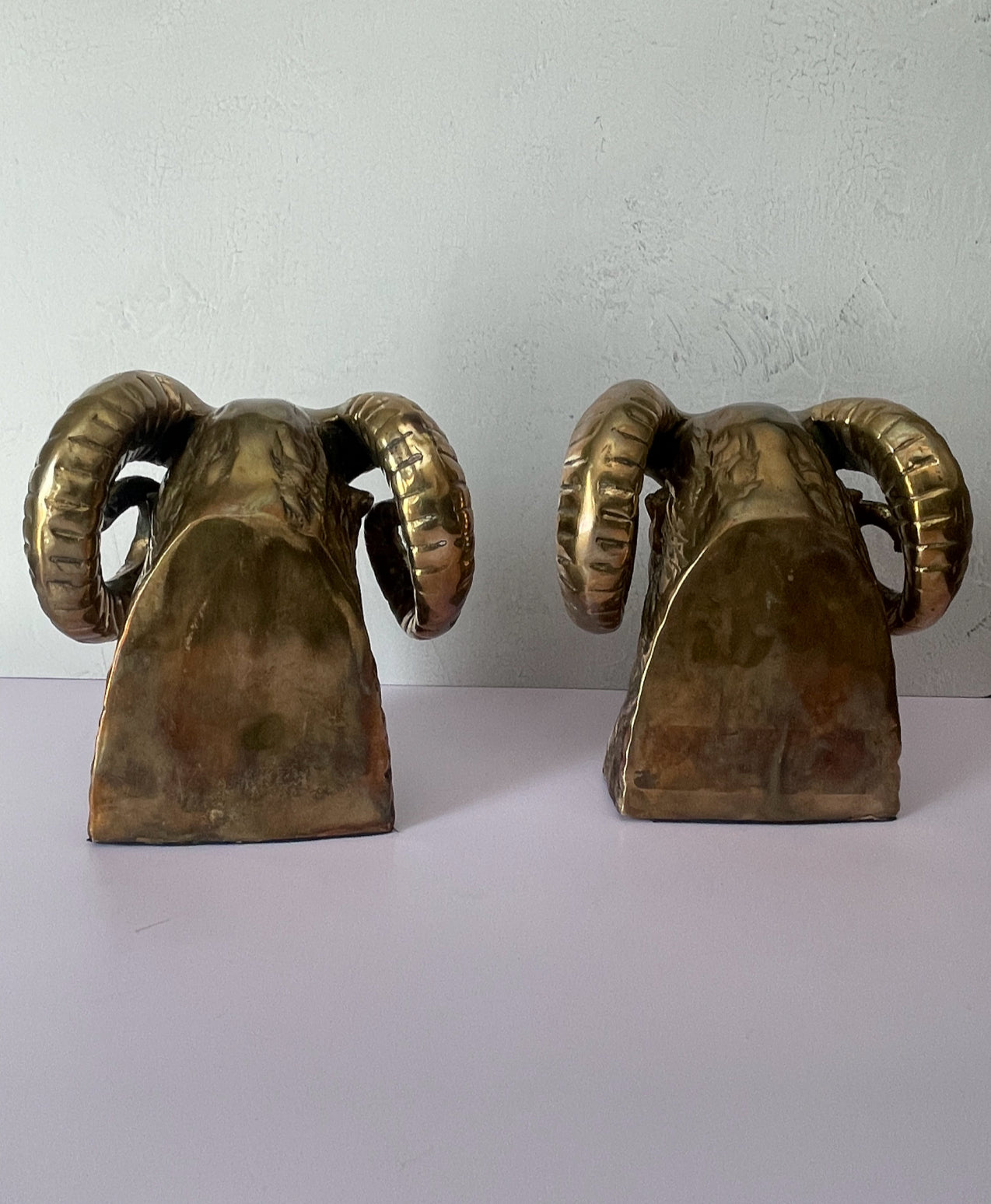 Vintage Mid-Century Brass Ram Bookends
- A Pair