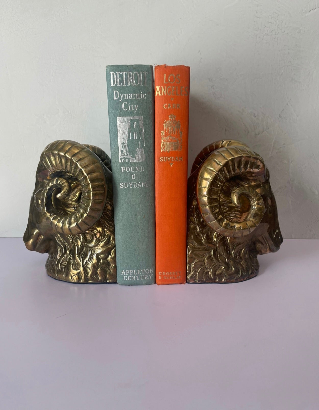 Vintage Mid-Century Brass Ram Bookends
- A Pair